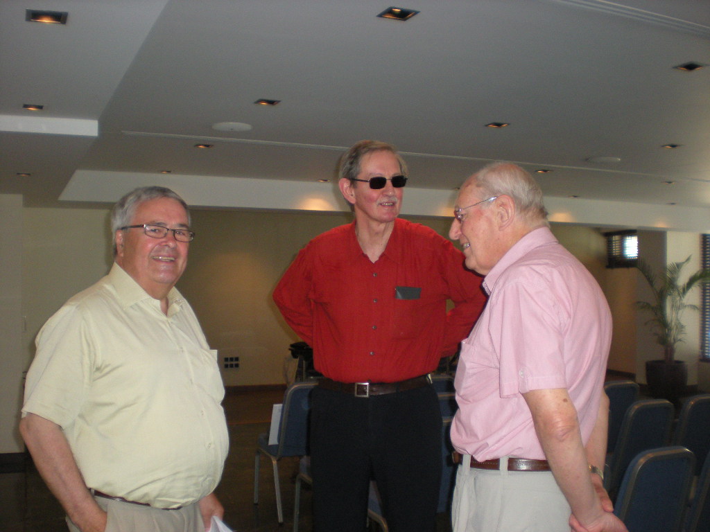 Ole Norrback  of the Finnish Committee with Professor Anthony Snodgrass and Chris Price of the British Committee